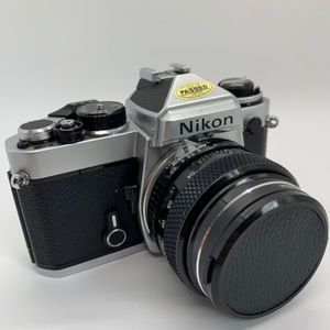 Nikon FE with 28mm f/2.5 Soligor Wide-Auto Lens and 52mm and Nikon Flash